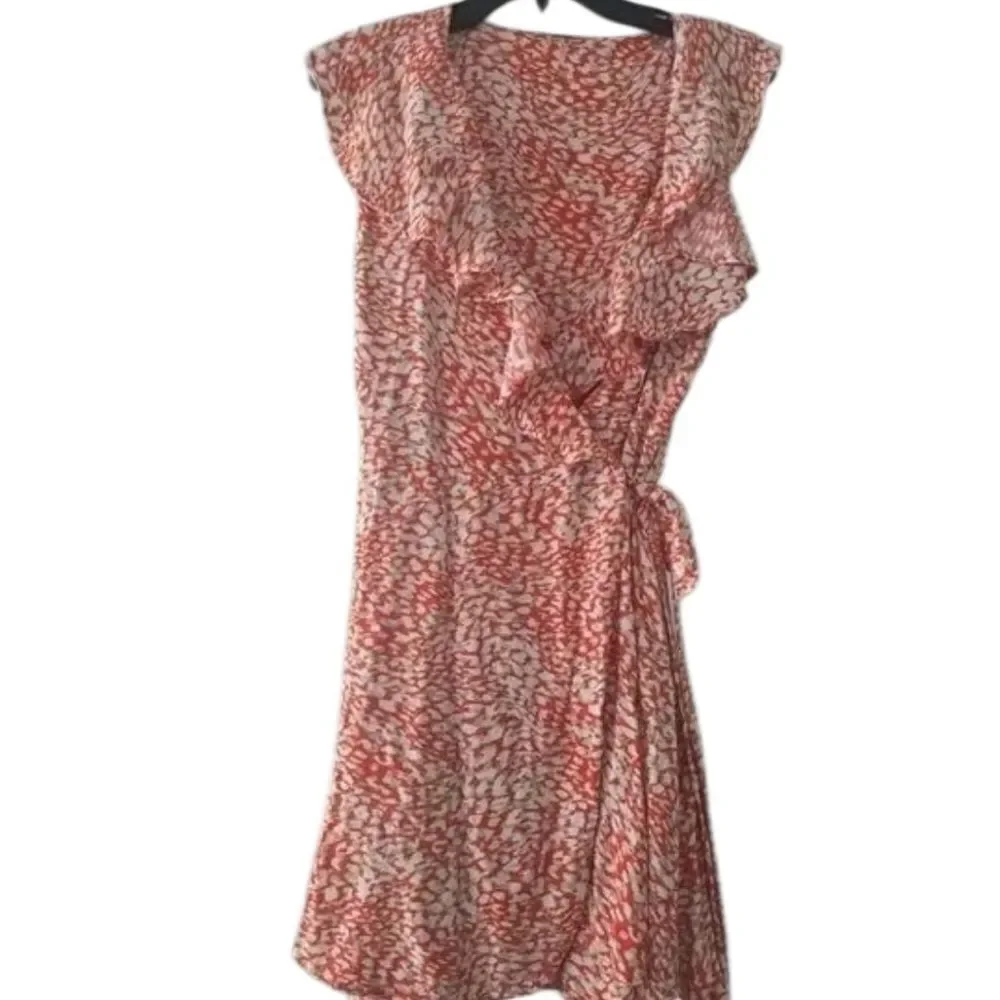 Free People French Quarter Wrap Mini Dress orange and white animal small